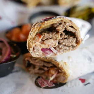 a burrito with meat and vegetables