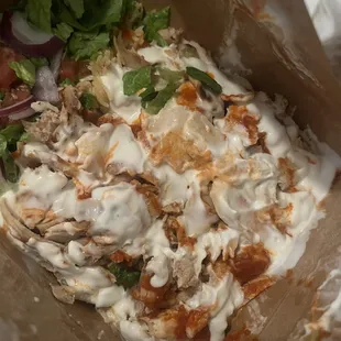 Chicken Over Rice With some spicy sauce! Super good. Love this place so much