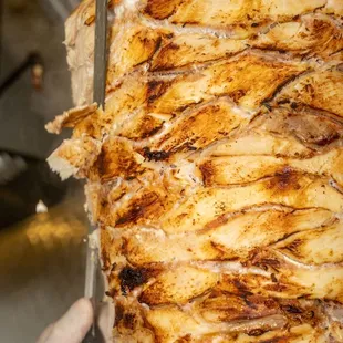 a close up of a person holding a knife