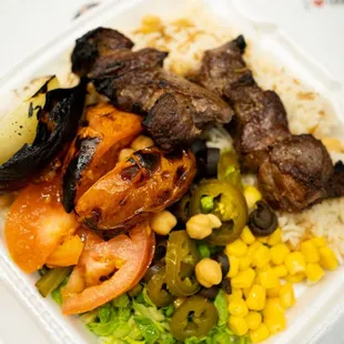 a meal in a styrofoam container