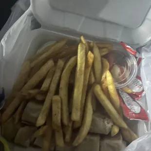 french fries in a styrofoam container