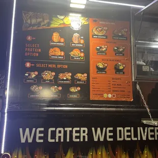 a food truck with a menu on it