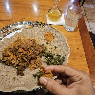 Beef Firfir with collards on the side. So bleeping good!