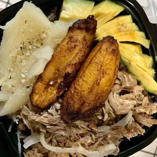 December 31st bowl: Roasted pork, Moro rice, fried sweet plantains, yuca con mojo and avocado