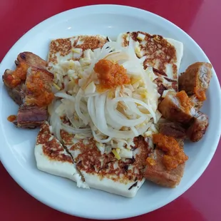 Grilled Venezuelan  cheese with pickled onion and zuchinni with a chicarron on the side!