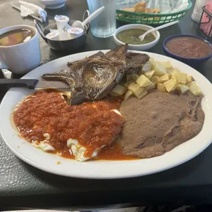 Huevos rancheros with double pork chops