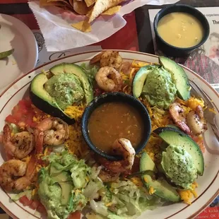 Shrimp salad appetizer single order. 4 scoops of guacamole and sliced avocados. This is after I ate half of it. Yum!!!