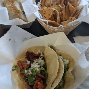 Tacos pastor and chicharon.   Breakfast burrito