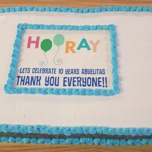 a birthday cake with balloons