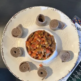 a bowl of soup and crackers