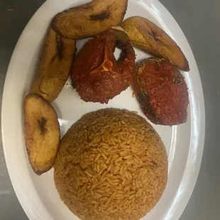 Jollof Rice served with fish and dodo