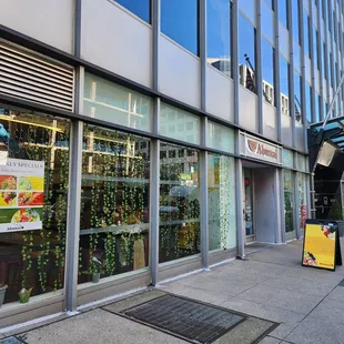 the outside of a building with a sign in the window