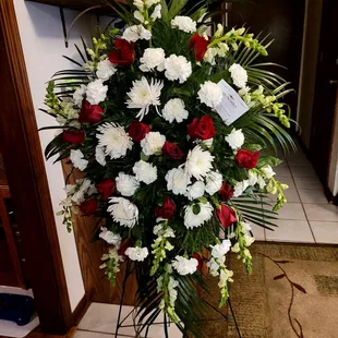 Red and white easel spray