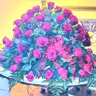 Red roses casket spray