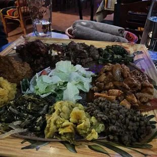 (Doro Wot, Doro Tibes, Atkilt Wot, Gomen, lentils, split peas) and more. Gluten Free Injera!!