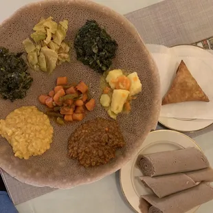 Vegetarian platter for one and cabbage sambuusa