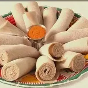 a platter of rolls of food