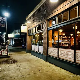 Lots of windows facing the street and the bus stop right out front