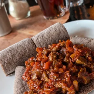 Kilwa Beggie - lamb stew with tomato and onion