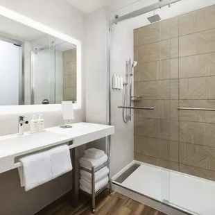 Indulge in the luxury of our meticulously designed bathrooms, where sophistication meets serenity. Immerse yourself in a haven of tranquilit