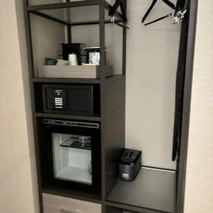 Coffee maker, safe, mini fridge ironing board