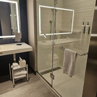 Rain shower or handle spout option. Weird handle function though.