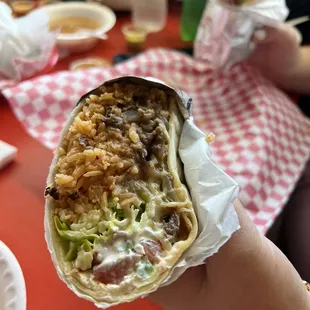 Half of a carne asada burrito