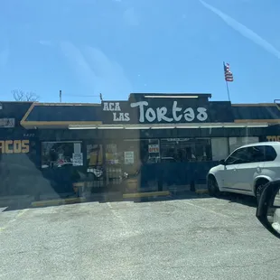 Outside, small parking lot