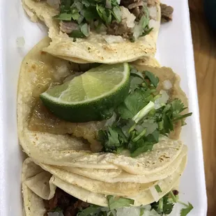 Chorizo taco, weird crackling pork taco, and al Pastor taco