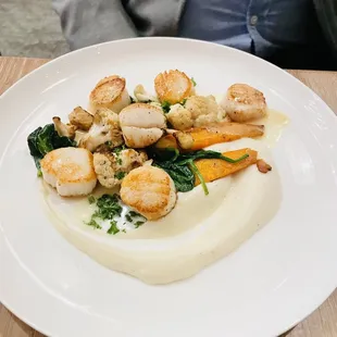 Scallops on a bed of veggies and cauliflower puree