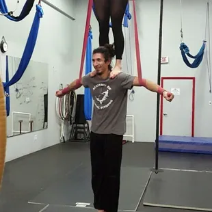 Aerial strap specialist Eddie Barron.  Beginner aerial strap classes 6pm Mondays