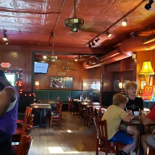 a group of people sitting at tables