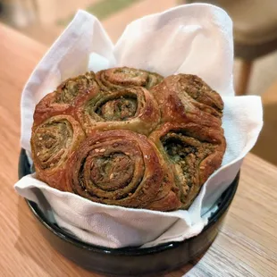 a pastry in a basket on a table