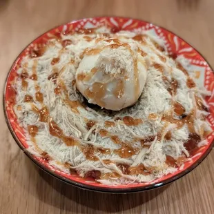 a bowl of food with a scoop of ice cream
