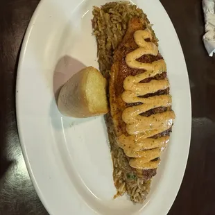 Blackened catfish over dirty rice