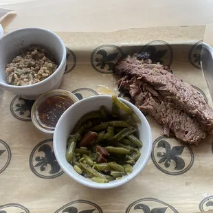 Brisket plate with green beans and rice dressing