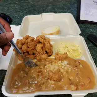 Crawfish half and half. Too amazing even tho it's out of season. Definitely recommend this plate, or platter.
