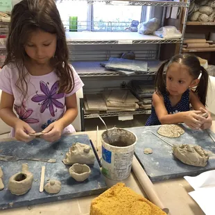 My girls making their various clay projects during a drop in session!:)