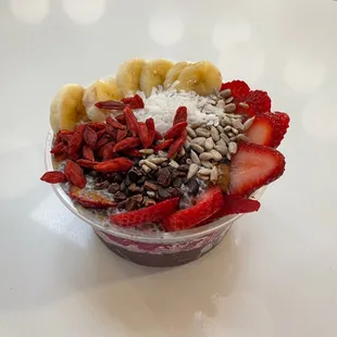 a bowl of fruit and nuts