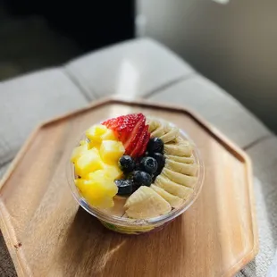 Organic Acai, Mango Coconut Chia Pudding, Pineapple, strawberry, blueberry, banana, black sesame paste