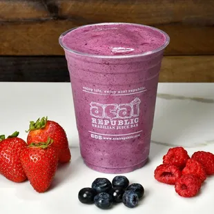 a smoothie with berries and raspberries