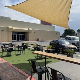 Outside seating with overhead coverage.