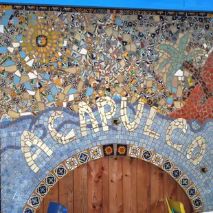 a colorful tile mural