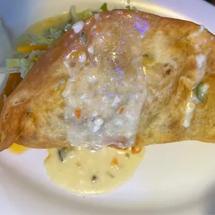 King Taco smothered w/ white queso