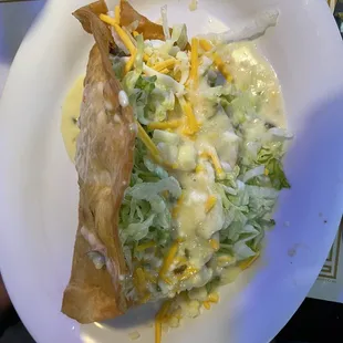 King Taco smothered w/ white queso