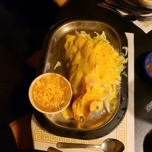 King Taco topped w/ white queso &amp; beans