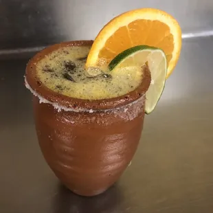 a drink with a slice of orange