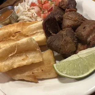 Chicharones and yucca! I love the salad that comes with it too!