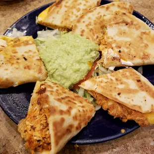 Shredded chicken quesadillas with guacamole