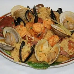 a plate of seafood and rice